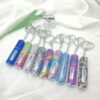 oly-aa63c6aece6ed31b2c26e41152feab62 Wholesale Fashion 5ml Refillable Perfume Spray Bottle Keychain Rhinestone Metal White Gift