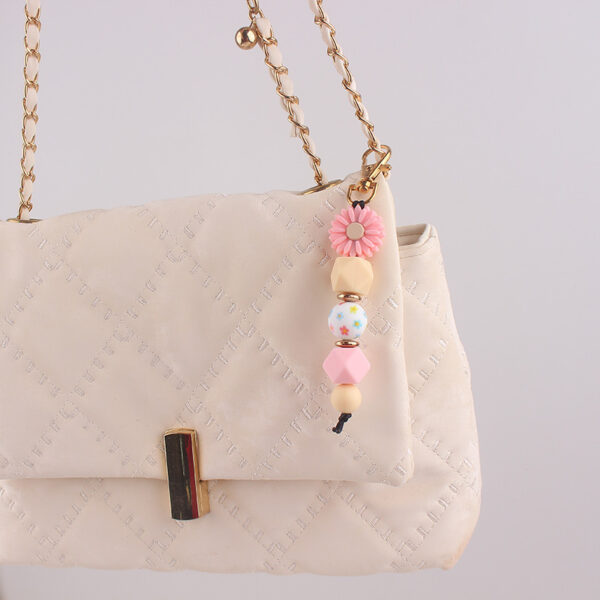 oly-ac56f4f6c9a9c9a67fe1f5dfecb53944 Wholesale DIY Silicone Bead Keychain Bag Charm Decorative Accessory for Everyday Use
