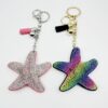 Wholesale Trendy Starfish Bag Charm Keychain Rhinestone Flannel Alloy Tassel Bell Boutique Resale Accessory