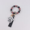 oly-b0f26114220029820df679f79869654b Wholesale Bean Paste Silicone Dog Paw Keychain Trendy Party Gift for Kids