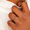 oly-b28eb7df2fa6232df5efb018366bee28 Wholesale Gold Alloy Hollow Double Heart Couple Ring - Adjustable Everyday Jewelry