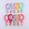oly-b37b3dd3cad1fac7a13da96930205427 Wholesale Pink Silicone Cartoon Flower Beaded Wristband Keychain Boutique Jewelry Accessory