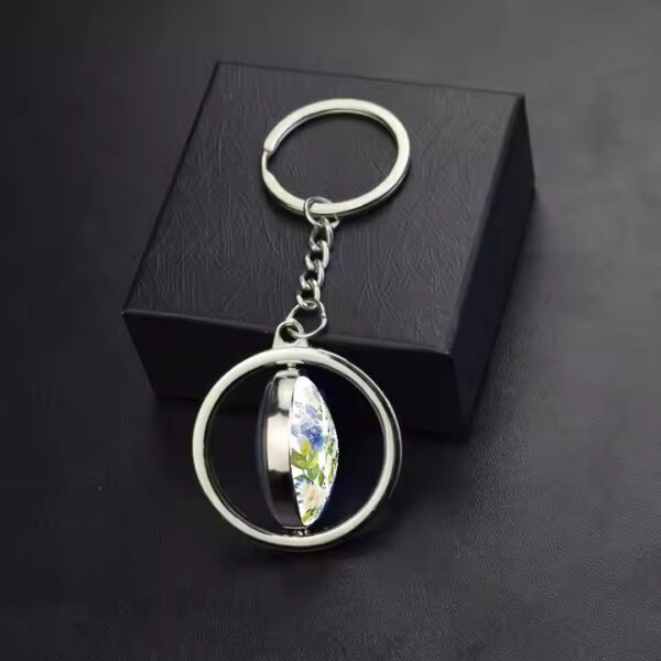 Wholesale Chic Inspirational Quote Rotating Flower Glass Pendant Keychain Jewelry Accessory for Resale