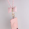 oly-b5523ba33c6f490e007994b9404b0458 Wholesale Silicone Dopamine Bow Phone Strap Heart Keychain Fashion Accessory Yellow