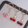 Wholesale Cute Miniature Cherry Keychain Pendant Light Pink Zinc Alloy Bag Charm Decorative Accessory