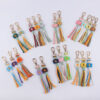oly-b817bbcc90ae8df2531f4f054319baa4 Wholesale Handmade Crochet Flower Keychain Beige Cotton Rope Korean Style Graduation Gift