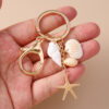 oly-b9e0c28dbf685b6d3be52deafe00a187 Wholesale Chic Resin Shell and Starfish Keychain - Beachy Decorative Accessory for Bag or Keys, Perfect Gift