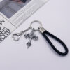 Wholesale Vintage Punk Cross Keychain Heart Pendant Black Metal Bag Charm for Bags and Keys