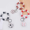 oly-bb19fc2c4982ad26f356f35cdaec3156 Wholesale Soccer Ball Silicone Bead Bracelet Keychain Graduation Gift Fashion Accessory