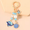 oly-bce74757419c2c09f2a22fd7941eaeac Wholesale Trendy Shell Whale Keychain Zinc Alloy Cartoon Ocean Animal Bag Charm