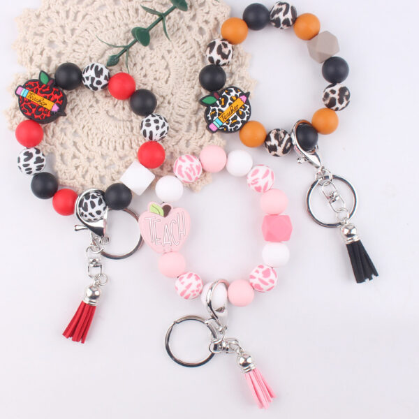 oly-bd2f0b57bcf478d5a7b9d07a7a2f370c Wholesale Design DIY Wrist Keychain Red Silicone Beaded Tassel Key Ring Accessory for Birthday Gifts