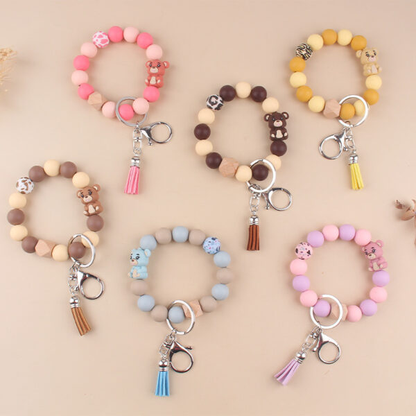 oly-bd47f63599e3f47e32c0aaf77567f2d4 Wholesale Silicone Cartoon Bear Keychain Accessory Korean Style Gray Blue Cute DIY Bead Bracelet Gift