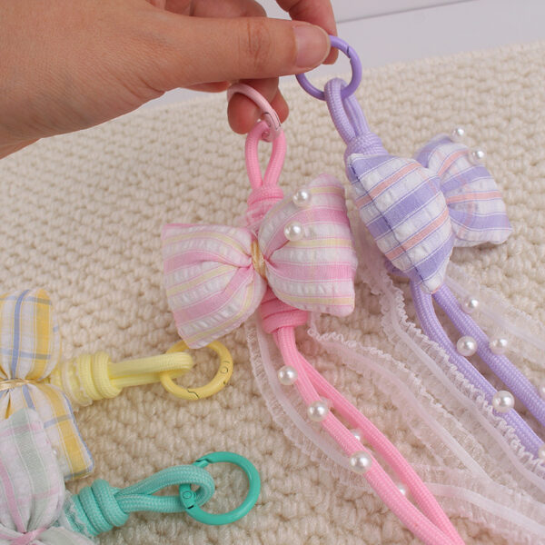 oly-c15597ade607e3a0216121cbba14efed Wholesale Pearl Bow Keychain Lolita Style Pink Beaded Charm for Bag Phone or Car Key Resale Gift
