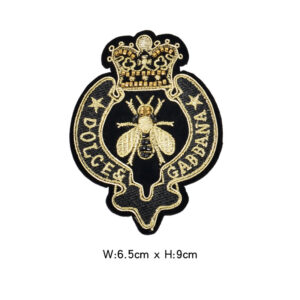 Light gold bee badge