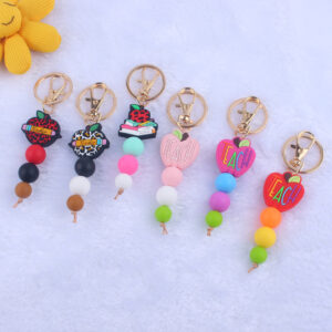 oly-c2828bba50b497cdf54ee0a03a3ecd43 Wholesale Trendy Pink Silicone Bead Keychain Decorative Accessory Gift