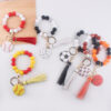 oly-c28a8870eebde48af8c892ab3650a1d7 Wholesale Silicone Football Wrist Keychain with DIY Beads Trendy Fashion Accessory for Gift or Everyday Use