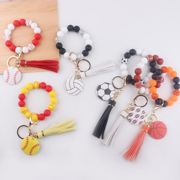 oly-c28a8870eebde48af8c892ab3650a1d7 Wholesale Silicone Football Wrist Keychain with DIY Beads Trendy Fashion Accessory for Gift or Everyday Use