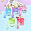 Wholesale Glow in the Dark Oil Filled Acrylic Bear Bag Charm Keychain Fashion Accessory Boutique Resale