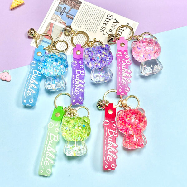 Wholesale Glow in the Dark Oil Filled Acrylic Bear Bag Charm Keychain Fashion Accessory Boutique Resale