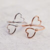 oly-c2e93233187196b98dc78e604a9935eb Wholesale Gold Alloy Hollow Double Heart Couple Ring - Adjustable Everyday Jewelry