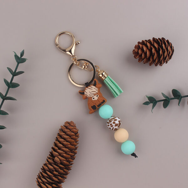 oly-c304d40d98e67cbb0c85eafc69c4069b Wholesale Green Silicone Yak Tassel Keychain Fashion Accessory Gift for Party