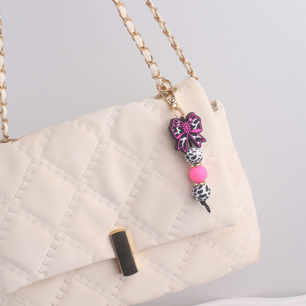 oly-c3cfd0b8f812e3ddd63a68acebf36763 Wholesale Silicone Keychain with Denim Style Bow Fashion Accessory for Bags Keys Gifts