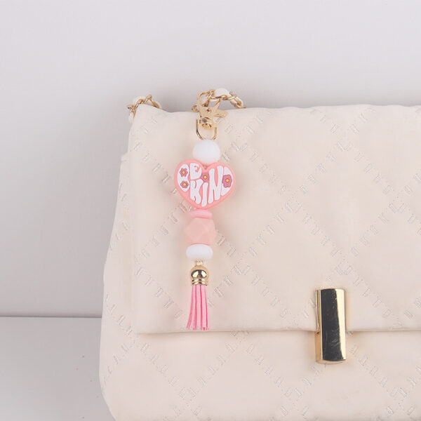 oly-c3f06d430bc7c4fbbbb70f01eb4acc1d Wholesale Silicone Heart Keychain Bag Charm Korean Style Pink Tassel Pendant Gift