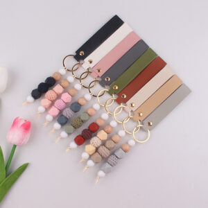 oly-c3f2e07802fb1e79cfa6e87500f3f5e5 Wholesale Trendy Silicone Keychain Bag Charm Car Key Accessory DIY Pendant for Birthday Gift Resale