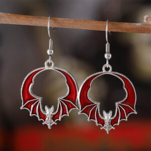 A pair of silver and red bat earrings