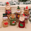 oly-c4b8986af2936771cb0d54cb7b8b2bbd Wholesale Burlap Christmas Gift Bag Cartoon 3D Drawstring with Jingle Bell Holiday Decor