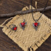 oly-c4e7ef28eb06d45e40759974e2c3bed7 Wholesale Vintage Dark Raven Ruby Heart Pendant Necklace and Ring Set Zinc Alloy Fashion Accessory for Resale
