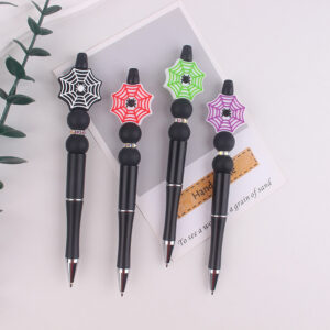 oly-c51635bc663d99901cc2a0e3c5e4c07c Wholesale Creative Handmade Spider Web Silicone Beaded Rotating Pen Decorative Office Craft Supply