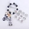 oly-c51f2a3f82c9325ee3445e91b1ed7582 Wholesale Silicone Cartoon Cow Head Keychain with Bead Bracelet and Tassel Korean Style Decorative Accessory