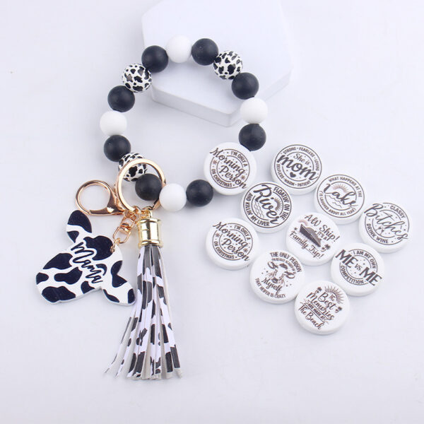 oly-c51f2a3f82c9325ee3445e91b1ed7582 Wholesale Silicone Cartoon Cow Head Keychain with Bead Bracelet and Tassel Korean Style Decorative Accessory