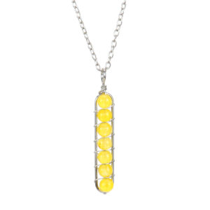 White K yellow beads (synthetic)