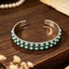 oly-c81153374704af80e16327c26a6e015e Wholesale Vintage Bohemian Double-Row Turquoise Open Bangle Cuff Jewelry Accessory for Gift Boutique Resale
