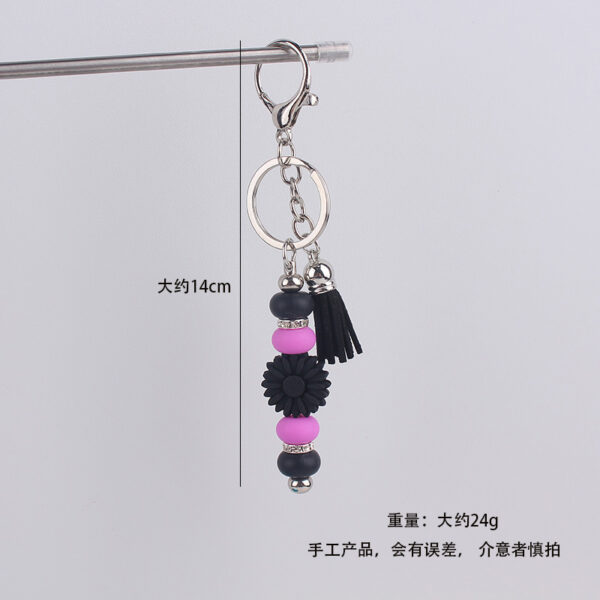 oly-c81a2f4b49e7edf69d189256f527971c Wholesale Silicone Keychain - Stylish Bag Charm with Tassel, Pink, Party Favor Gift