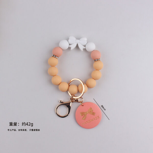 oly-c8f96527b56347d9f02faf923fbff493 Wholesale Trendy Silicone Bow Keychain Bracelet Mother's Day Gift Car Key Accessory