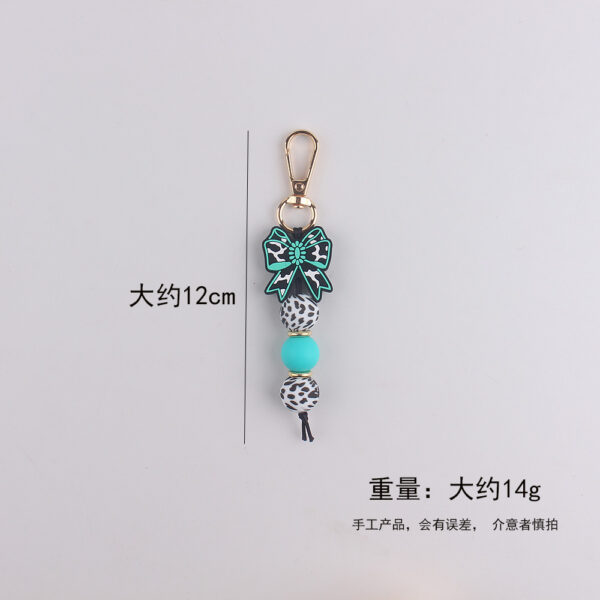 oly-c99196af85f9e1d06b093f1d9ba47742 Wholesale Silicone Keychain with Denim Style Bow Fashion Accessory for Bags Keys Gifts