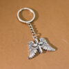 oly-cab37f11b4cf5f53cc098694571c01c4 Wholesale Punk Vintage Angel Wings Cross Keychain Pendant, Zinc Alloy Fashion Accessory for Bags