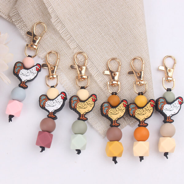oly-caee9c29356c17925cab8ad688880d8e Wholesale Silicone Cartoon Rooster Keychain DIY Handmade Bag Charm Gift for Festival