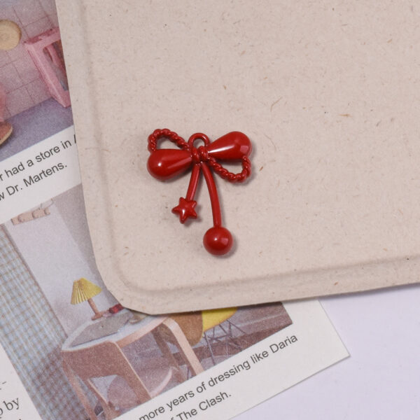 oly-cee171586c5f8d7b6ac3314783a0a47a Wholesale Cat Shape Star Bow Pendant Alloy DIY Phone Chain Fashion Accessory