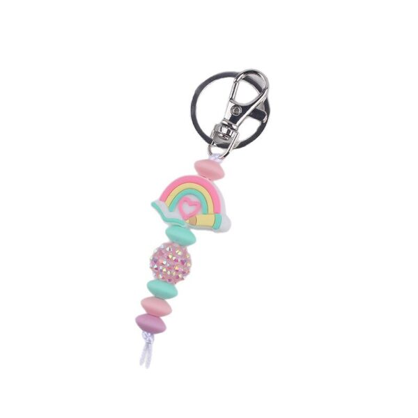 oly-d0cb2aa5b272ddcf7863fa9356f38530 Wholesale Silicone Book Keychain Ornament Party Gift Fashion Accessory