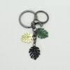 oly-d3fe8cc51f337f88fccd9ee86c9c5722 Wholesale Alloy Monstera Leaf Keychain Car Key Accessory for Boutique Resale