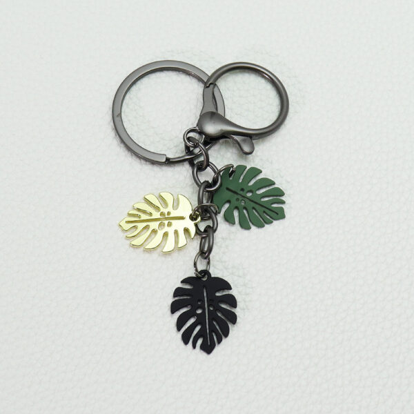 oly-d3fe8cc51f337f88fccd9ee86c9c5722 Wholesale Alloy Monstera Leaf Keychain Car Key Accessory for Boutique Resale