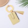 oly-d45074fd66c8a847f56ef545e7a5cf8a Wholesale PU Leather Tassel Keychain Wallet with Silicone Beads Card Holder for Women