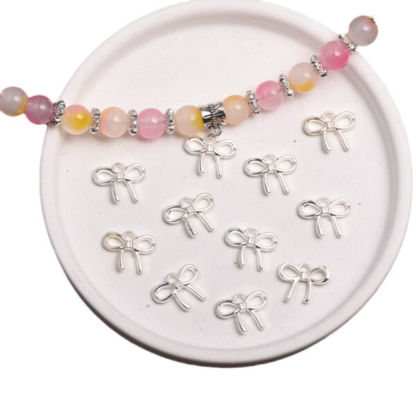 Wholesale Silver Alloy Light Luxury Bow Pendant DIY Jewelry Charm for Bracelet Phone Chain