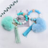 oly-d688b18253fd504c40acfc2d8e39d54a Wholesale European Style Silicone Beaded Wrist Keychain with Leather Tassel Chic Boutique Key Ring Accessory for Daily Use or Gifts