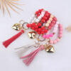 oly-d8b22f29ca60f8cc89a290ce0a1b3039 Wholesale Silicone Heart Bead Bracelet Keychain with Leather Tassel European Style Gift