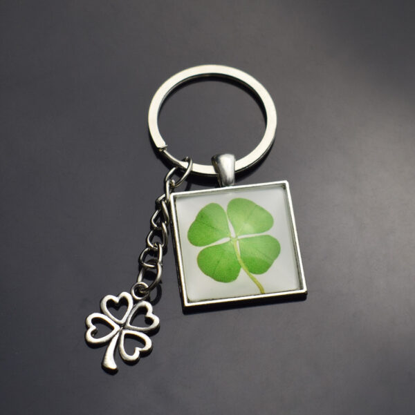 oly-d8e8bbb13d949297cd114b0b7e196f06 Wholesale Luminous Four Leaf Clover Keychain Pendant Fashion Jewelry Accessory for Gift or Boutique